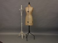 Lot 586 - A Chil-daw pioneer dressmakers dummy on wrought iron base and a wrought iron lamp standard (2)