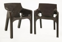 Lot 658 - A pair of 'Gaudi' armchairs