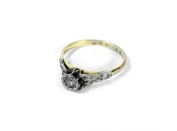 Lot 24 - A gold single stone diamond ring