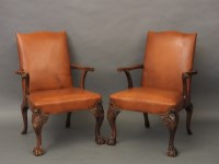 Lot 632 - A pair of walnut open armchairs
