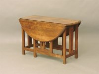 Lot 426 - Arts and Craft period low dropleaf table
