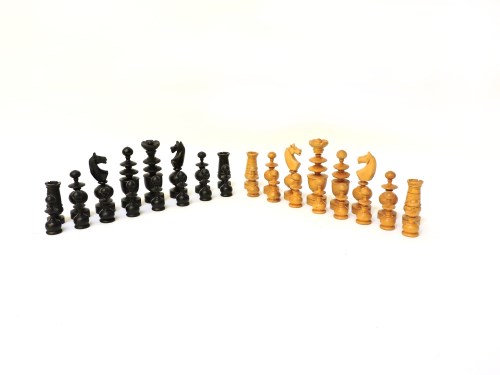 Lot 113 - A boxwood and ebonised Regence pattern chess set