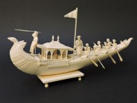 Lot 124 - A late 19th century Indian carved ivory model of a boat