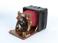 Lot 276 - An Edwardian "The Sanderson" mahogany and leather plate camera