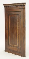 Lot 524 - A George III mahogany hanging corner cupboard