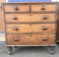 Lot 593 - A Victorian oak chest of two drawers over three drawers
