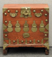 Lot 471 - An Eastern brass bound cabinet