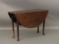 Lot 596 - An 18th century drop leaf table