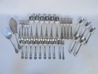 Lot 411 - A set of four William IV Queens pattern table forks
