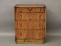 Lot 713 - An Art Deco figured walnut chest of drawers