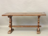 Lot 670 - An oak refectory table
