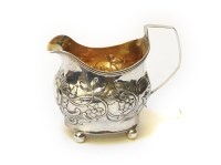 Lot 156 - A George III silver cream jug