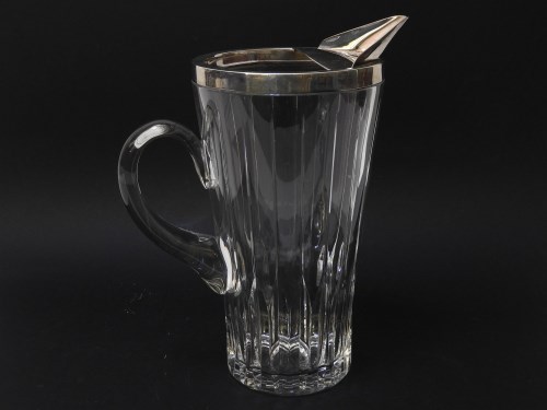 Lot 261 - A silver rimmed cut glass water jug