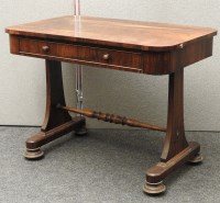 Lot 469 - An early 19th century rosewood single drawer writing table