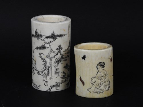 Lot 207 - Two late 19th century/early 20th century ivory brush pots