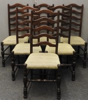 Lot 715 - A set of six country made ladder back dining chairs