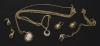Lot 45 - A 9ct gold garnet and diamond set pendant