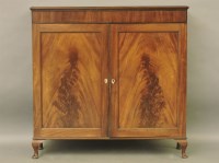 Lot 732 - A mahogany panelled cupboard