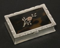 Lot 224 - A silver and tortoiseshell lid snuff box