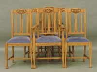 Lot 717 - A set of six Arts and Crafts light oak dining chairs