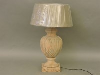 Lot 533 - A turned wooden table lamp of reeded baluster form