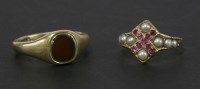 Lot 167 - A gold ruby and split pearl ring