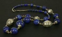 Lot 130 - A Continental silver bead and lapis lazuli bead necklace