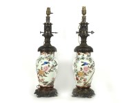 Lot 507 - A pair of Chinese porcelain lamps