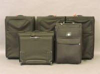 Lot 546 - Four large 'Tumi' black suitcases