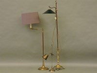 Lot 690 - Two modern brass standard lamps