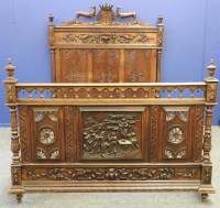 Lot 768 - A continental carved oak double bed