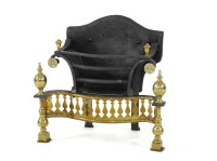 Lot 802 - An iron and brass fire grate