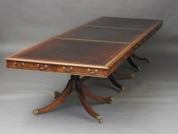 Lot 660 - A large board room table in three parts