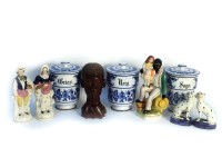 Lot 420 - A set of three German Schzierback blue and white porcelain spice jars and covers (af)