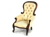 Lot 747 - A Victorian spoon back chair upholstered in a pale fabric