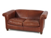 Lot 549 - A leather two seater settee