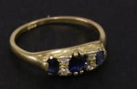 Lot 32 - A three stone sapphire ring