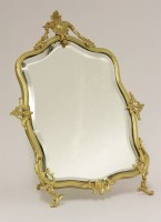 Lot 49 - A gilt bronze table mirror