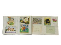 Lot 128 - Two books with stuck in children's birthday cards