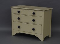 Lot 520 - A small painted chest of two small and two large drawers
