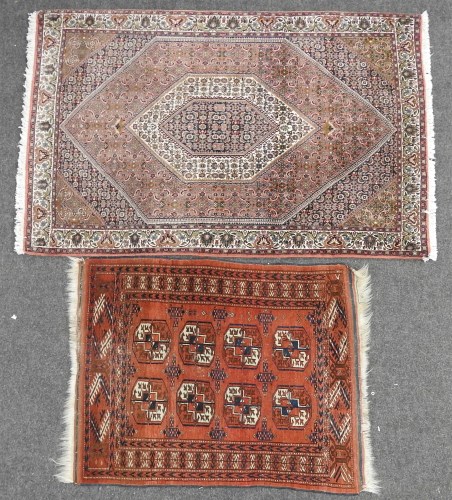 Eastern Style Rugs Lot 424 - Two eastern rugs