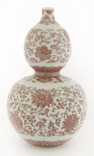 Lot 316 - An iron red double gourd vase