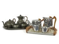 Lot 214 - A Piquot ware four piece tea set
