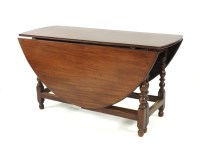 Lot 482 - A mahogany top gate leg table