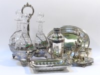 Lot 255 - A silver plated triple decanter