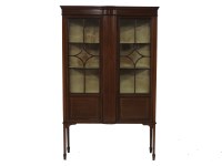 Lot 437 - An Edwardian and mahogany inlaid display cabinet