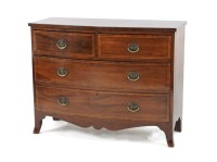 Lot 420 - A George III mahogany bow front chest of two short above two long drawers