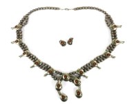 Lot 89A - A native American Navajo coral coloured cabochon set design squash blossom necklace