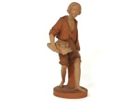 Lot 174 - A Watcombe pottery figure