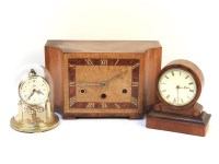Lot 242 - An Art Deco walnut cased mantel clock